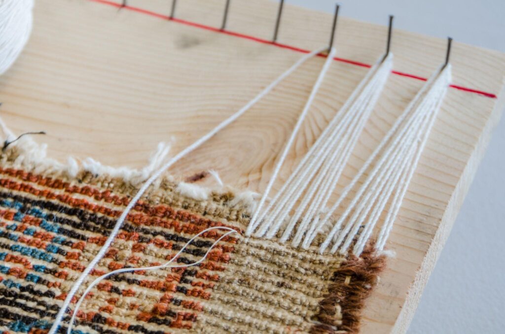 Handwoven rug fringe repair and restoration process in Dallas Fort Worth